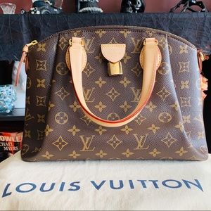 Louis Vuitton New Rivoli PM Monogram Handbag